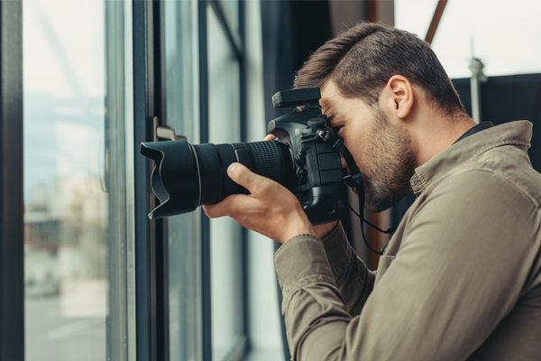 man taking a photo