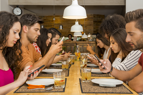 group of people on their smartphones